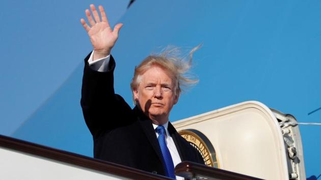 US President Donald Trump waves as he boards Air Force One to depart for Vietnam from Beijing Airport in Beijing, China, (REUTERS) US President Donald Trump waves as he boards Air Force One to depart for Vietnam from Beijing Airport in Beijing, China, (REUTERS)
