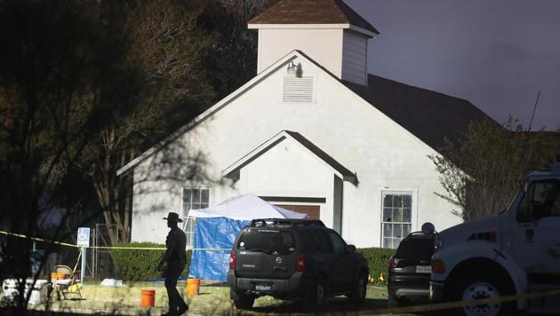 Law enforcement officials continue their investigation at Sutherland Springs Baptist Church in Texas. (AFP) Law enforcement officials continue their investigation at Sutherland Springs Baptist Church in Texas. (AFP)
