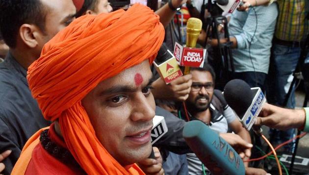 President of Hindu Mahasabha Swami Chakrapani comes out after bidding for one of the assets of Dawood Ibrahim during an auction in Mumbai in 2015. (PTI File Photo) President of Hindu Mahasabha Swami Chakrapani comes out after bidding for one of the assets of Dawood Ibrahim during an auction in Mumbai in 2015. (PTI File Photo)