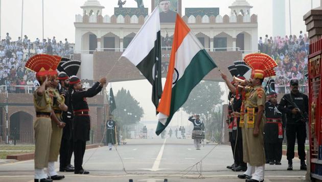 Pakistani Rangers and Indian Border Security Force personnel perform during the daily beating of the retreat ceremony at the India-Pakistan Wagah Border Post on October 30. (AFP Fie Photo) Pakistani Rangers and Indian Border Security Force personnel perform during the daily beating of the retreat ceremony at the India-Pakistan Wagah Border Post on October 30. (AFP Fie Photo)