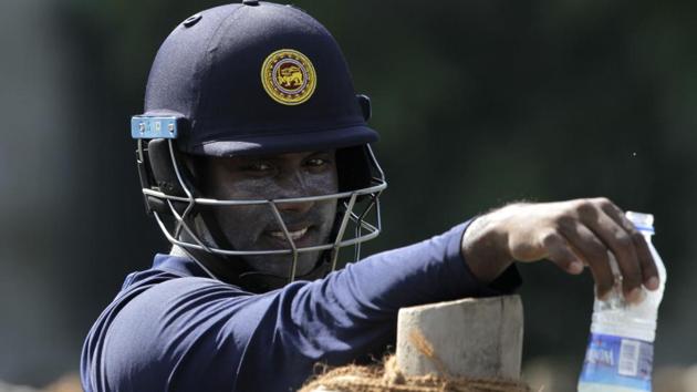 Sri Lanka's Angelo Mathews takes a break during the practice session ahead of their Test series against India. (AP) Sri Lanka's Angelo Mathews takes a break during the practice session ahead of their Test series against India. (AP)