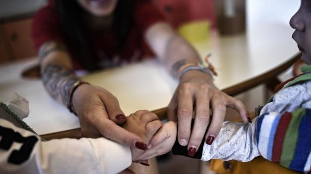 Prison educators have seen significant improvement in the behaviour and interaction of inmates’ children with other kids. “Being able to play with lots of other children is very positive. And when we go into the prison with photos and films to show the mothers the progress they’ve made, you can see their eyes light up watching their kids doing the same stuff as all the others”, said Valeria Caenazzo of the Stripes cooperative running the nursery. (Marco Bertorello / AFP) Prison educators have seen significant improvement in the behaviour and interaction of inmates’ children with other kids. “Being able to play with lots of other children is very positive. And when we go into the prison with photos and films to show the mothers the progress they’ve made, you can see their eyes light up watching their kids doing the same stuff as all the others”, said Valeria Caenazzo of the Stripes cooperative running the nursery. (Marco Bertorello / AFP)