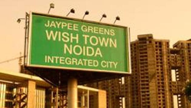 A file picture of a billboard advertising Jaypee’s housing project Wish Town in Noida.(Mint)