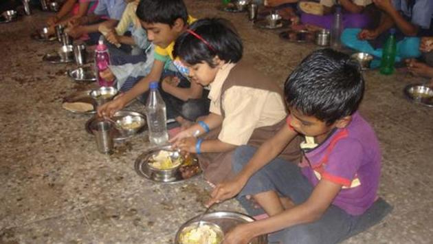 A group of parents reached the government-run primary school at Doli village in Damoh district on Thursday after their children complained they were allegedly asked to clean the toilet using the utensils (thali) in which they were served the mid-day meal. (HT File Photo) A group of parents reached the government-run primary school at Doli village in Damoh district on Thursday after their children complained they were allegedly asked to clean the toilet using the utensils (thali) in which they were served the mid-day meal. (HT File Photo)