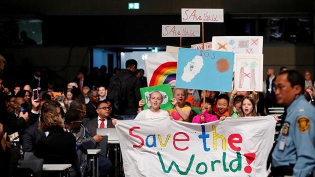 Children take part in a climate march prior to the opening session of the COP23 UN Climate Change Conference 2017, hosted by Fiji but held in Bonn, Germany. Over the next two weeks, negotiators will try to clarify the rulebook of the 2015 Paris climate agreement, reports the BBC. (Wolfgang Rattay / REUTERS) 