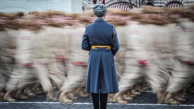 Participants march during a military parade at Red Square in Moscow on November 7, 2017. Russia marked the 76th anniversary of the 1941 historical parade, when the Red Army marched past Kremlin’s walls to the front line against Nazi Germany’s troops in World War II. (Mladen Antonov / AFP) Participants march during a military parade at Red Square in Moscow on November 7, 2017. Russia marked the 76th anniversary of the 1941 historical parade, when the Red Army marched past Kremlin’s walls to the front line against Nazi Germany’s troops in World War II. (Mladen Antonov / AFP)