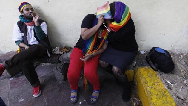 A light moment from the 2012 Pride march in New Delhi as participants take a break. (Virendra Singh Gosain / HT Photo) A light moment from the 2012 Pride march in New Delhi as participants take a break. (Virendra Singh Gosain / HT Photo)