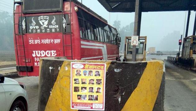 Police have pasted posters of ‘wanted’ gangsters at all key points, including toll plazas, in and around Amritsar. (HT Photo) Police have pasted posters of ‘wanted’ gangsters at all key points, including toll plazas, in and around Amritsar. (HT Photo)