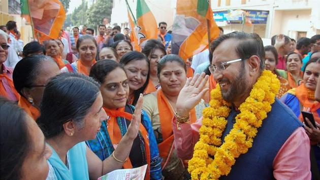 Union minister Prakash Javadekar interacts with people during door to door election campaigning for BJP for Gujarat assembly elections in Rajkot. (PTI Photo) Union minister Prakash Javadekar interacts with people during door to door election campaigning for BJP for Gujarat assembly elections in Rajkot. (PTI Photo)