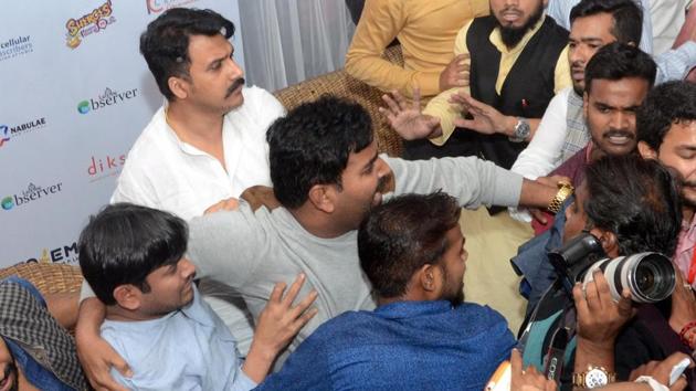 People shout slogans against former JNU students' union president Kanhaiya Kumar (L) during a function in Lucknow. (PTI Photo) People shout slogans against former JNU students' union president Kanhaiya Kumar (L) during a function in Lucknow. (PTI Photo)