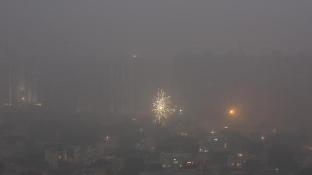 Residential buildings are enveloped in a blanket of smog on the outskirts of New Delhi. (AP Photo) Residential buildings are enveloped in a blanket of smog on the outskirts of New Delhi. (AP Photo)