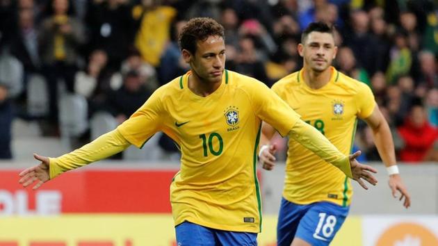 Neymar celebrates scoring Brazil’s first goal vs Japan. Brazil won the game 3-1.(REUTERS)