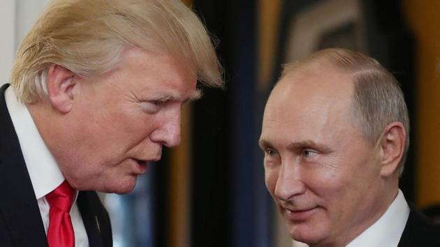 US President Donald Trump chats with Russia's President Vladimir Putin as they attend the APEC Economic Leaders' Meeting, part of the Asia-Pacific Economic Cooperation (APEC) leaders' summit in Danang on November 11. (AFP Photo) US President Donald Trump chats with Russia's President Vladimir Putin as they attend the APEC Economic Leaders' Meeting, part of the Asia-Pacific Economic Cooperation (APEC) leaders' summit in Danang on November 11. (AFP Photo)