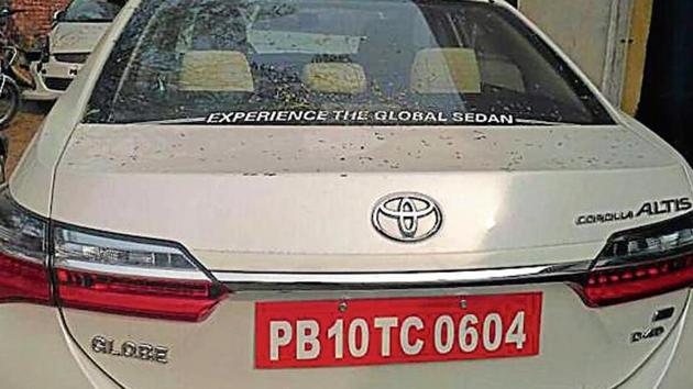 The Toyota Corolla car which was taken away but was found abandoned in Gurey village in Ludhiana. (HT Photo) The Toyota Corolla car which was taken away but was found abandoned in Gurey village in Ludhiana. (HT Photo)