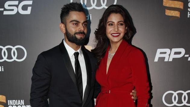 Virat Kohli and Anushka Sharma looked elegant as arrived at the Red Carpet of Indian Sports Honours in Mumbai. (Ht Photo)