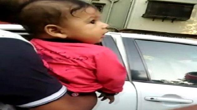 A video, which went viral on Saturday, showed a woman breastfeeding her seventh-month-old child in a car while the Mumbai Traffic Police towed the vehicle. (ANI Twitter Photo) A video, which went viral on Saturday, showed a woman breastfeeding her seventh-month-old child in a car while the Mumbai Traffic Police towed the vehicle. (ANI Twitter Photo)