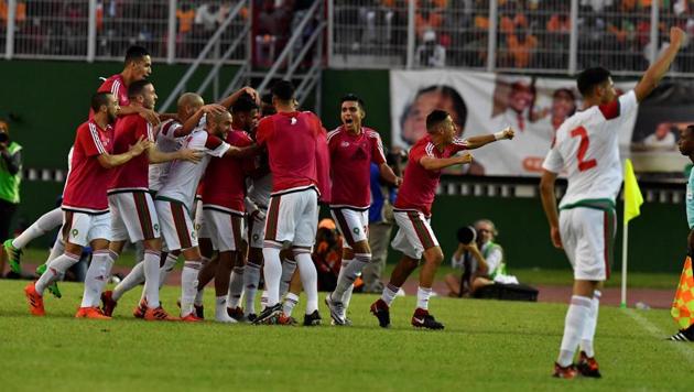 Morocco players celebrate at the Felix Houphouet-Boigny stadium in Abidjan on November 11, 2017, at the end of the FIFA World Cup 2018 Africa Group C qualifying match between Ivory Coast and Morocco. Morocco won 2-0. (AFP) Morocco players celebrate at the Felix Houphouet-Boigny stadium in Abidjan on November 11, 2017, at the end of the FIFA World Cup 2018 Africa Group C qualifying match between Ivory Coast and Morocco. Morocco won 2-0. (AFP)
