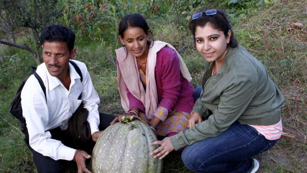 Kanika (R), who left her job in a multinational company and set up organic village resort, called Dyo, in Mukteshwar in Nainital district, with her produce. (HT Photo)