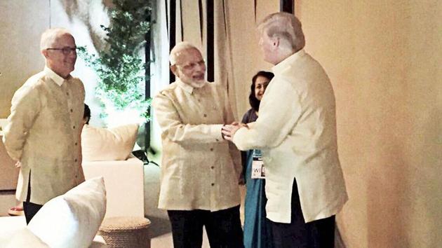 Prime Minister Narendra Modi shakes hands with US President Donald Trump during a meeting in Manila on Sunday. (PTI Photo) Prime Minister Narendra Modi shakes hands with US President Donald Trump during a meeting in Manila on Sunday. (PTI Photo)