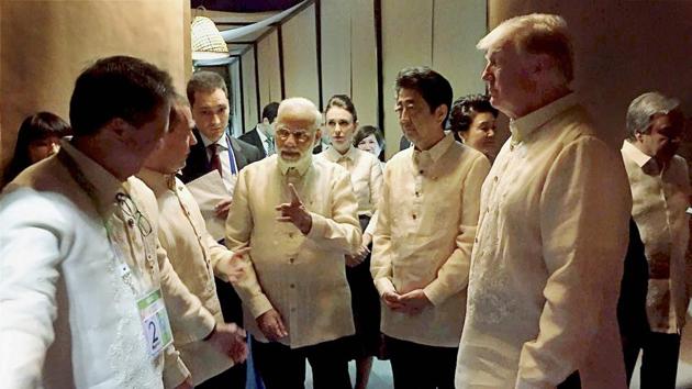 Prime Minister Narendra Modi with US President Donald Trump, Japanese PM Shinzo Abe and other world leaders at an ASEAN Summit dinner in Manila on Sunday. (PTI) Prime Minister Narendra Modi with US President Donald Trump, Japanese PM Shinzo Abe and other world leaders at an ASEAN Summit dinner in Manila on Sunday. (PTI)