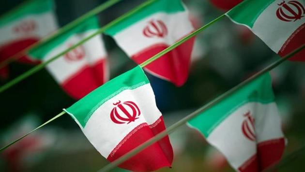 Iran's national flags are seen on a square in Tehran February 10, 2012, a day before the anniversary of the Islamic Revolution. (Reuters File Photo) Iran's national flags are seen on a square in Tehran February 10, 2012, a day before the anniversary of the Islamic Revolution. (Reuters File Photo)