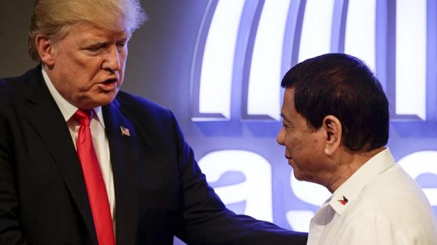 US President Donald Trump shakes hands with Philippine President Rodrigo Duterte before the opening ceremony of the 31st ASEAN Summit in Manila, Philippines Monday, Nov. 13, 2017. (AP) US President Donald Trump shakes hands with Philippine President Rodrigo Duterte before the opening ceremony of the 31st ASEAN Summit in Manila, Philippines Monday, Nov. 13, 2017. (AP)