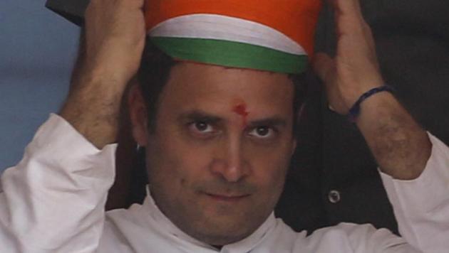 Rahul Gandhi holds a turban presented to him during a public meeting at Himmatnagar in Gujarat. (AP File Photo) Rahul Gandhi holds a turban presented to him during a public meeting at Himmatnagar in Gujarat. (AP File Photo)