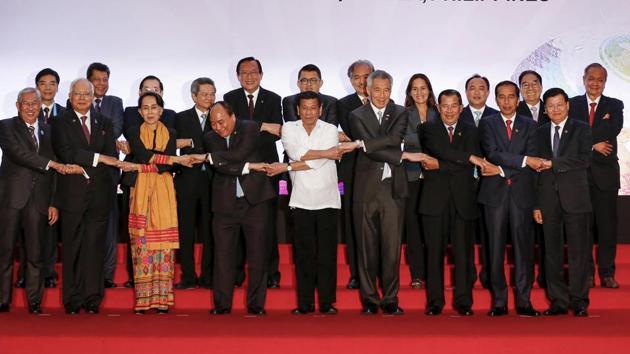 Philippine President Rodrigo Duterte, front center, links hands with delegates of ASEAN Leaders' Interface with ASEAN Business Advisory Council during the ASEAN Summit in Manila, Philippines, Monday, Nov. 13, 2017. (AP) Philippine President Rodrigo Duterte, front center, links hands with delegates of ASEAN Leaders' Interface with ASEAN Business Advisory Council during the ASEAN Summit in Manila, Philippines, Monday, Nov. 13, 2017. (AP)
