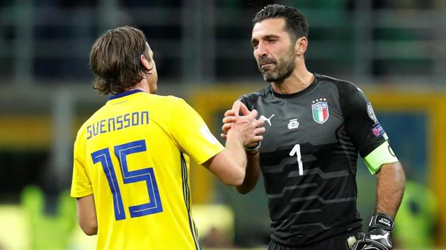 Italy’s Gianluigi Buffon shakes the hand of Sweden’s Gustav Svensson after their FIFA World Cup play-off against Sweden.(REUTERS)