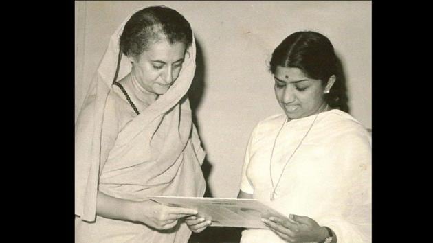 Indira Gandhi seen receiving a Long Play Record (LPR) of Meera Bai’s ‘bhajans,’ recorded in the voice of Lata Mangeshkar (R), circa 1968. (Courtesy Indira Gandhi Memorial Trust Archive) Indira Gandhi seen receiving a Long Play Record (LPR) of Meera Bai’s ‘bhajans,’ recorded in the voice of Lata Mangeshkar (R), circa 1968. (Courtesy Indira Gandhi Memorial Trust Archive)