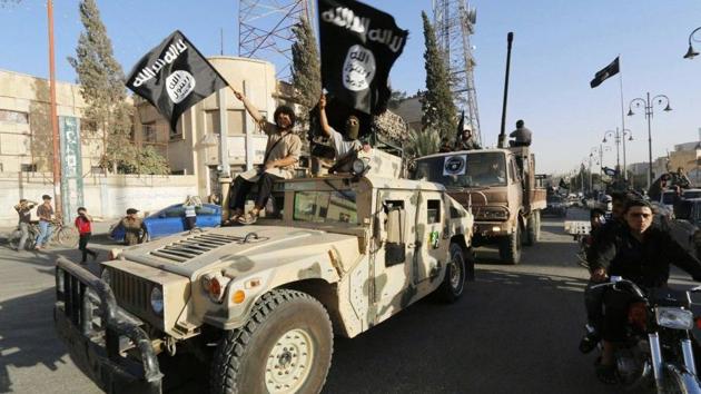 A convoy of almost 50 trucks, 13 buses and more than 100 IS vehicles left the bombed out Raqqa on October 12, “under the gaze of the US and British-led coalition and Kurdish-led forces who control the city. (Reuters File Photo) A convoy of almost 50 trucks, 13 buses and more than 100 IS vehicles left the bombed out Raqqa on October 12, “under the gaze of the US and British-led coalition and Kurdish-led forces who control the city. (Reuters File Photo)
