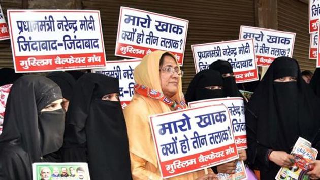 BJP supporters in the Muslim community hold placards against the triple talaq practice during an election campaign in New Delhi. While some appreciate the saffron party for appropriating the issue, others believe it has “interfered with the community’s faith”.(PTI File)