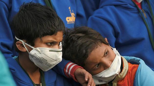 Children wearing air pollution masks attend a demonstration to spread awareness on the problem of air pollution, on Children's Day in New Delhi on Tuesday. (PTI) Children wearing air pollution masks attend a demonstration to spread awareness on the problem of air pollution, on Children's Day in New Delhi on Tuesday. (PTI)