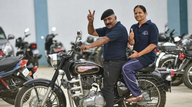 Anand Singh Shekhawat and his wife Krishna Shekhawat who went to Mysore from Kota on a bike to participate in a national-level swimming competition; Krishna bagged three medals. (A.H.Zaidi/HT Photo) Anand Singh Shekhawat and his wife Krishna Shekhawat who went to Mysore from Kota on a bike to participate in a national-level swimming competition; Krishna bagged three medals. (A.H.Zaidi/HT Photo)