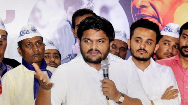 Patidar leader Hardik Patel interacts with people during an event in Ahmedabad.(PTI)