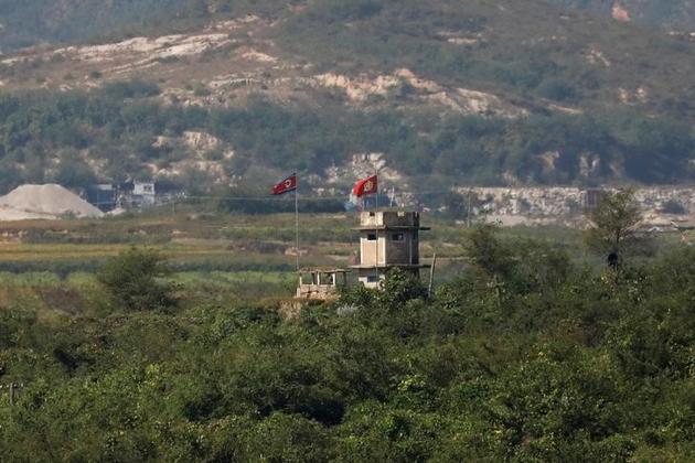 A North Korean flag flutters at a guard post near the propaganda village of Gijungdong in North Korea, in this picture taken near the truce village of Panmunjom, South Korea.(Reuters File Photo)