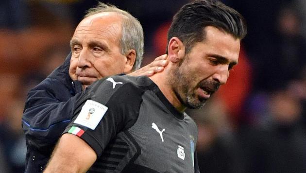 Italy coach Gian Piero Ventura, left, consoles Gianluigi Buffon after their FIFA World Cup play-off loss against Sweden. (AP) Italy coach Gian Piero Ventura, left, consoles Gianluigi Buffon after their FIFA World Cup play-off loss against Sweden. (AP)