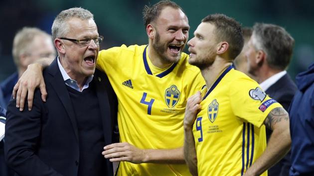 Sweden coach Janne Andersson (L) celebrates with Andreas Granqvist and Marcus Berg. (AP) Sweden coach Janne Andersson (L) celebrates with Andreas Granqvist and Marcus Berg. (AP)