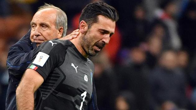 Italy coach Gian Piero Ventura, left, consoles Gianluigi Buffon at the end of the encounter. (AP) Italy coach Gian Piero Ventura, left, consoles Gianluigi Buffon at the end of the encounter. (AP)