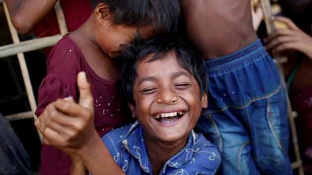 Nur and his siblings share a moment outside their shelter at Palong Khali refugee camp. Nur and his mother hope he can eventually pick up a trade in Bangladesh. For Nur however, talk of school and football still figures in the conversation. (Adnan Abidi / REUTERS) Nur and his siblings share a moment outside their shelter at Palong Khali refugee camp. Nur and his mother hope he can eventually pick up a trade in Bangladesh. For Nur however, talk of school and football still figures in the conversation. (Adnan Abidi / REUTERS)