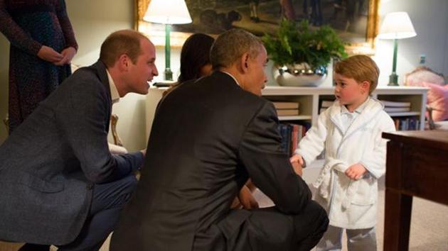 In this hand out photo released by Kensington Palace, Britain's Prince George meets with US President Barack Obama in London. (AP File Photo)