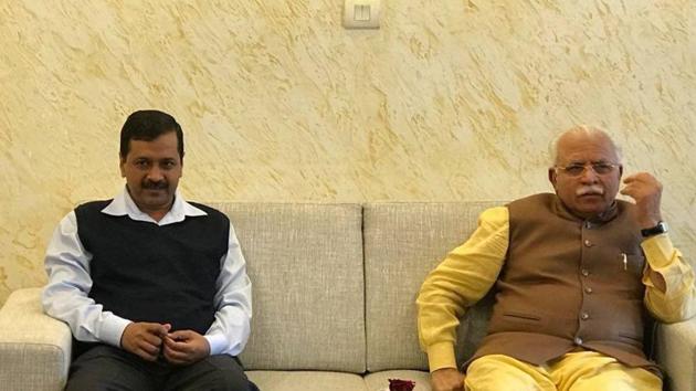 Delhi CM Arvind Kejriwal (left) with Haryana counterpart ML Khattar at his residence in Chandigarh on Wednesday. ((HT Photo)) Delhi CM Arvind Kejriwal (left) with Haryana counterpart ML Khattar at his residence in Chandigarh on Wednesday. ((HT Photo))