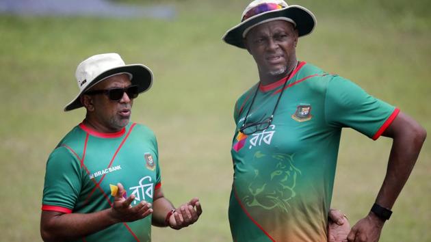 Bangladesh head coach Chandika Hathurusingha, left, and bowling coach Courtney Walsh talk during a practice session in August, 2017. Hathurusingha has resigned as Bangladesh coach. (AP) Bangladesh head coach Chandika Hathurusingha, left, and bowling coach Courtney Walsh talk during a practice session in August, 2017. Hathurusingha has resigned as Bangladesh coach. (AP)