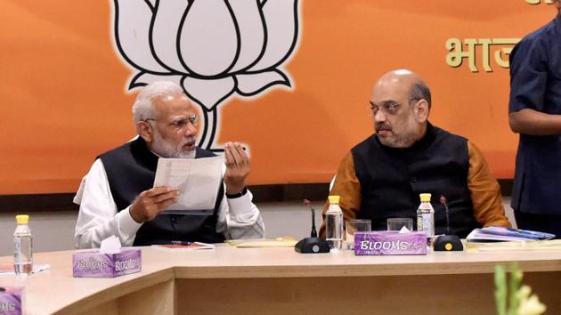 Prime Minister Narendra Modi and BJP president Amit Shah during the BJP Central Election Committee meeting at the BJP headquarters in New Delhi on Wednesday. (PTI) Prime Minister Narendra Modi and BJP president Amit Shah during the BJP Central Election Committee meeting at the BJP headquarters in New Delhi on Wednesday. (PTI)