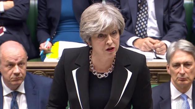 A still image taken from footage broadcast by the UK Parliamentary Recording Unit shows Prime Minister Theresa May as she speaks during the weekly Prime Minister's Questions session in the House of Commons in London on November 15, 2017.(AFP)