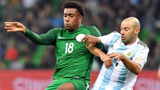 Nigeria's Alexander Iwobi (L) and Argentina's Javier Mascherano vie for the ball during their international friendly match. (AFP) Nigeria's Alexander Iwobi (L) and Argentina's Javier Mascherano vie for the ball during their international friendly match. (AFP)