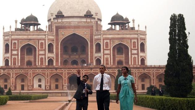US President Barack Obama with Michelle Obama at the Humayun's Tomb in New Delhi. (AFP Photo)