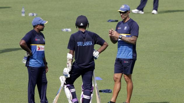 Sri Lanka coach Nic Pothas (R) talks with Rangana Herath (L) during a practice session ahead of the first Test. (AP) Sri Lanka coach Nic Pothas (R) talks with Rangana Herath (L) during a practice session ahead of the first Test. (AP)