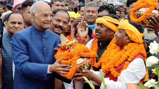 President Ram Nath Kovind being welcomed by tribals as he arrives to pay floral tributes at the statue of Birsa Munda in Ranchi on Wednesday. (PTI) President Ram Nath Kovind being welcomed by tribals as he arrives to pay floral tributes at the statue of Birsa Munda in Ranchi on Wednesday. (PTI)