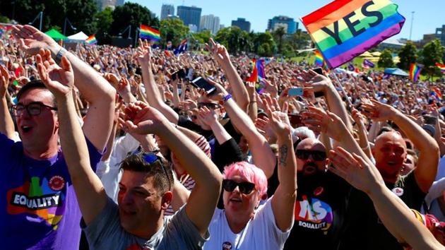 Supporters of the Yes vote for marriage equality celebrate after it was announced the majority of Australians support same-sex marriage in a national survey, paving the way for legislation to make the country the 26th nation to formalise the unions by the end of the year, at a rally in central Sydney on Wednesday. (Reuters Photo) Supporters of the Yes vote for marriage equality celebrate after it was announced the majority of Australians support same-sex marriage in a national survey, paving the way for legislation to make the country the 26th nation to formalise the unions by the end of the year, at a rally in central Sydney on Wednesday. (Reuters Photo)